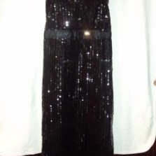 продаю эксклюзивное молодежное платье черного цвета с поетками 44 размера