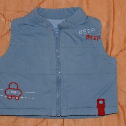 Теплая жилетка