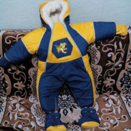 Продаю зимний комбинезон на овчине