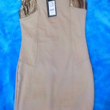 продаю новое платье с кожаными вставками