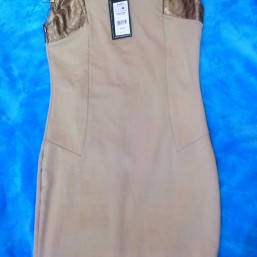 продаю новое платье с кожаными вставками