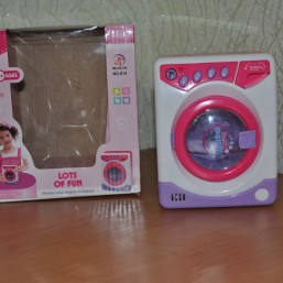 Игрушечная стиральная машинка 
