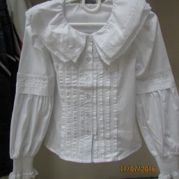 Белая блузка на девочку