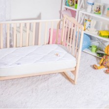 Наматрасник стеганый в кроватку