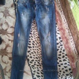 Джинсы , состояние новых