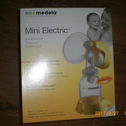 Электрический молокоотсос 