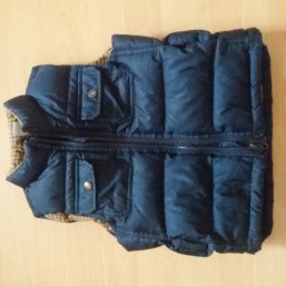 Жилетка на пуху 